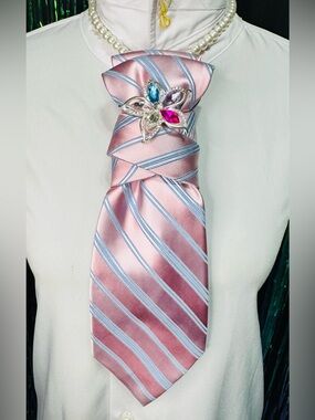 Elegant Pink and Blue Striped Necktie featuring Multicolored Brooch